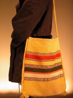 The Greek Shoulder bag was an unexpensive and practical bag carried by students in the 1960's and 70's. They came in many different color combinations women could choose from.