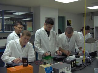 Students taking notes on experimetal observations