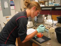 Teacher performing an experiment